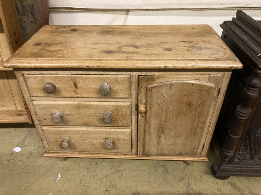 A Victorian pine dresser base, together with a panelled pine plate rack, base width 107cm, depth 50cm, height 80cm